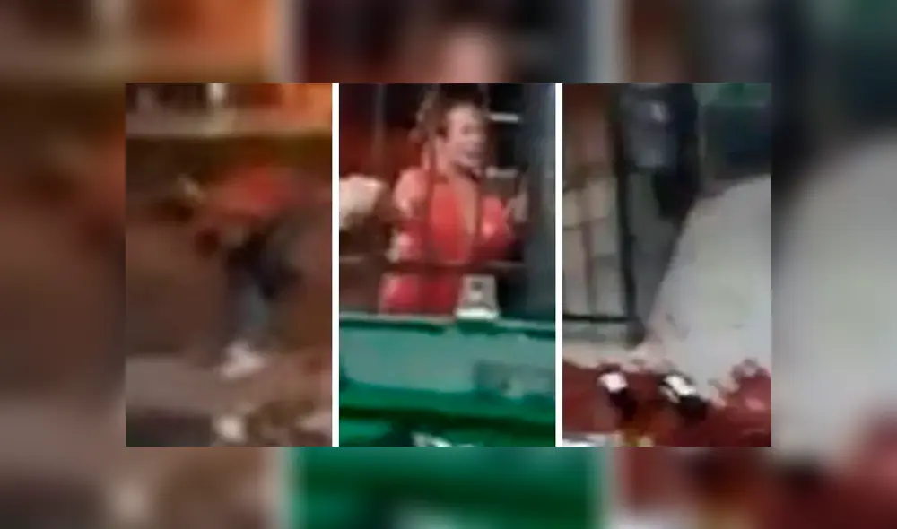 La mujer lanzó improperios y atacó con piedras el establecimiento. (Captura: Clarín)