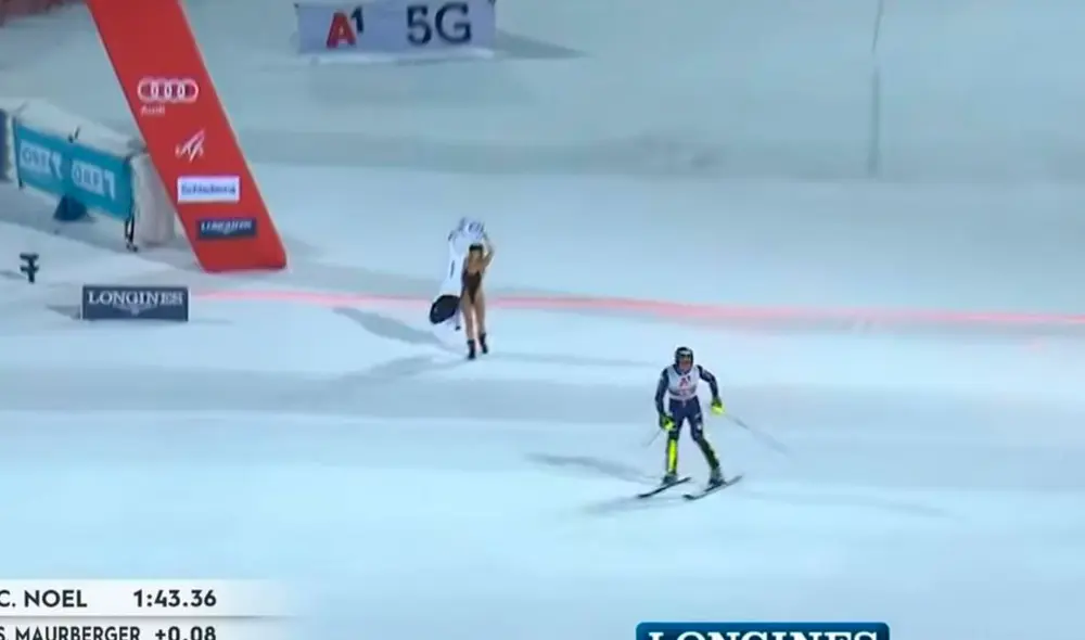 Kinsey Wolanski irrumpió en el Mundial de Esquí en plena carrera del italiano Alex Vinatzer. Foto: Captura