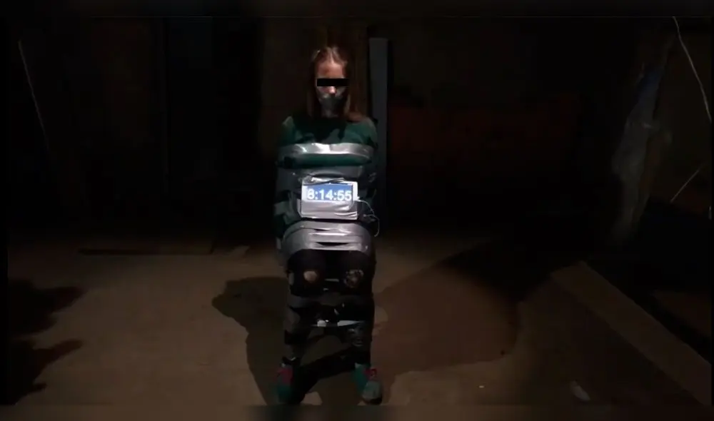 Indignación en internet, por video de chica atada y con una 'cuenta regresiva' [VIDEO]