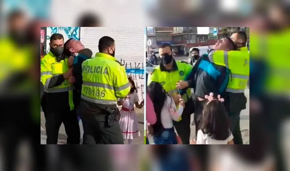 Un hombre sin mascarilla que es sujetado del cuello por dos policías. (Foto: Pulzo) Un hombre sin mascarilla que es sujetado del cuello por dos policías. (Foto: Pulzo)