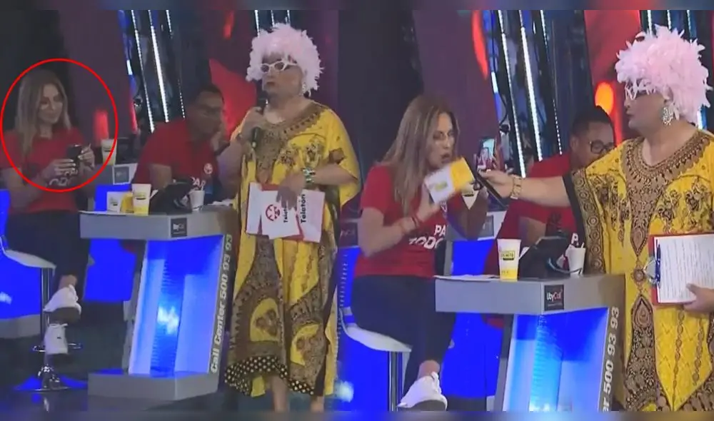 Jorge Benavides reclama a Karina Rivera al ser captada chateando en Teletón Jorge Benavides reclama a Karina Rivera al ser captada chateando en Teletón