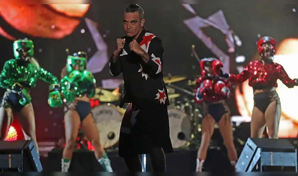 Robbie williams reta a Liam Gallagher a una pelea de box
