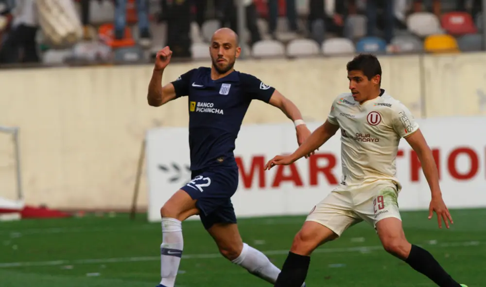 Federico Rodríguez y Aldo Corzo disputando un balón en el clásico. | Foto: GLR