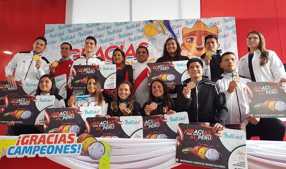 Medallistas en los Juegos Lima 2019 fueron premiados con laptops y beneficios en salud por clínica privada. (FOTO: Jessica Merino).