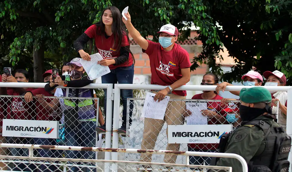 Ciudadanos venezolanos saludan a Leopoldo López (fuera de cuadro) el 11 de diciembre, cuando el líder opositor venezolano estuvo en Cúcuta (Colombia). Foto: AFP Ciudadanos venezolanos saludan a Leopoldo López (fuera de cuadro) el 11 de diciembre, cuando el líder opositor venezolano estuvo en Cúcuta (Colombia). Foto: AFP