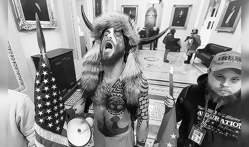 A supporter of President Donald Trump chants outside the Senate Chamber inside the Capitol, Wednesday, Jan. 6, 2021 in Washington. (AP Photo/Manuel Balce Ceneta) A supporter of President Donald Trump chants outside the Senate Chamber inside the Capitol, Wednesday, Jan. 6, 2021 in Washington. (AP Photo/Manuel Balce Ceneta)