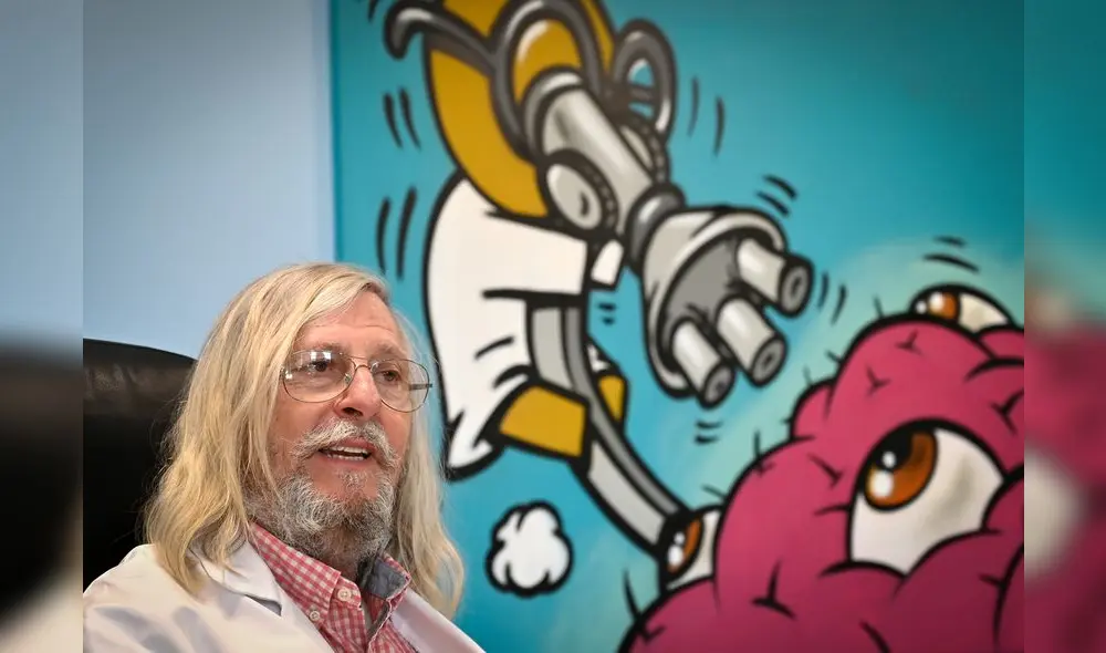 A picture taken on February 26, 2020 shows French professor Didier Raoult, biologist and professor of microbiology, specialized in infectious diseases and director of IHU Mediterranee Infection Institute posing in his office in Marseille, southeastern France. - Raoult reported this week that after treating 24 patients for six days with Plaquenil, the virus had disappeared in all but a quarter of them. The research has not yet been peer reviewed or published, and Raoult had come under fire by some scientists and officials in his native France for potentially raising false hopes. (Photo by GERARD JULIEN / AFP)