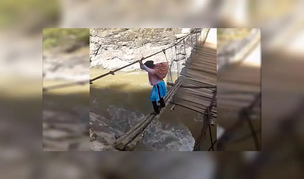 Pobladores arriesgan su vida al cruzar creciente río por una cuerda [VIDEO]