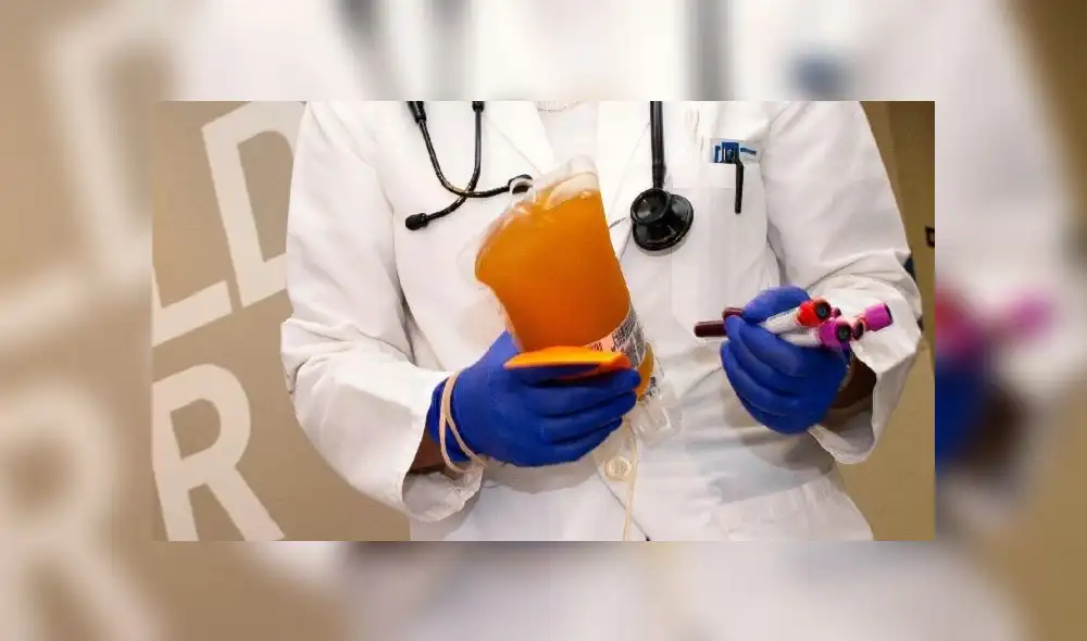 Customers buy food from a vendor (R) at a meat stall in Wuhan in China's central Hubei province on April 18, 2020. (Photo by Hector RETAMAL / AFP) Customers buy food from a vendor (R) at a meat stall in Wuhan in China's central Hubei province on April 18, 2020. (Photo by Hector RETAMAL / AFP)