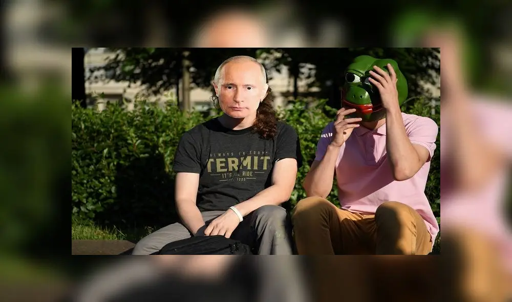 A person wearing a mask depicting Russian President Vladimir Putin along with the  others gathers on Pushkinskaya Square to protest against amendments to the Constitution of Russia in downtown Moscow on July 1, 2020, as Russians vote in the final day of a ballot on constitutional reforms allowing President Putin to potentially stay in power until 2036. (Photo by Kirill KUDRYAVTSEV / AFP)