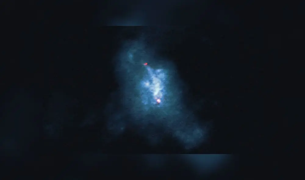 NGC 6240, formada por dos galaxias cuyos agujeros negros supermasivos (puntos rojos) están atrapados en la colisión. Crédito: ALMA. NGC 6240, formada por dos galaxias cuyos agujeros negros supermasivos (puntos rojos) están atrapados en la colisión. Crédito: ALMA.