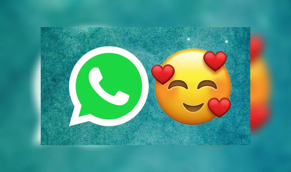 El tierno emoji de WhatsApp de la carita con corazones.