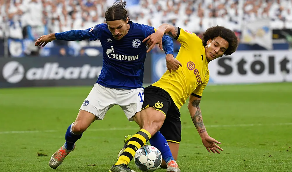 Borussia Dortmund y Schalke 04 protagonizan uno de los primeros partidos en el regreso de la Bundesliga tras dos meses de parón. | Foto: AFP Borussia Dortmund y Schalke 04 protagonizan uno de los primeros partidos en el regreso de la Bundesliga tras dos meses de parón. | Foto: AFP