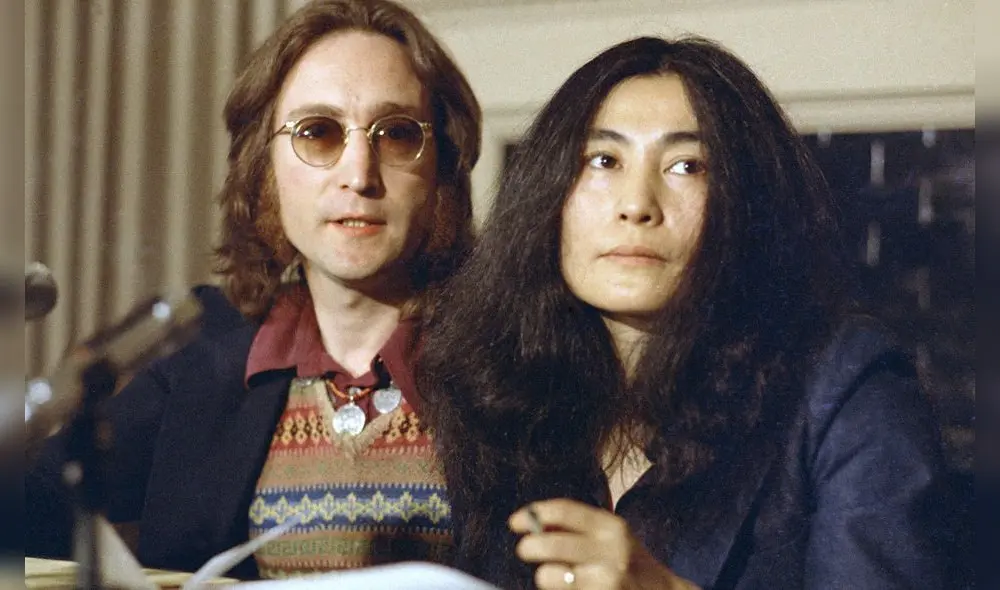 FILE - In this April 2, 1973 file photo, John Lennon and his wife, Yoko Ono, speak at a news conference in New York. Six months before he died, Lennon set sail from Newport, R.I., on an ocean adventure to Bermuda that awakened his desire to make music again and is now being chronicled in an electronic format he could not have conceived of. A new app, "John Lennon: The Bermuda Tapes," is being offered for sale on Apple devices Thursday, Nov. 14, 2013 for $4.99. It's loaded with interactive features, music, photos and interviews that detail a relatively unexamined slice of the former Beatle's life. (AP Photo, File)