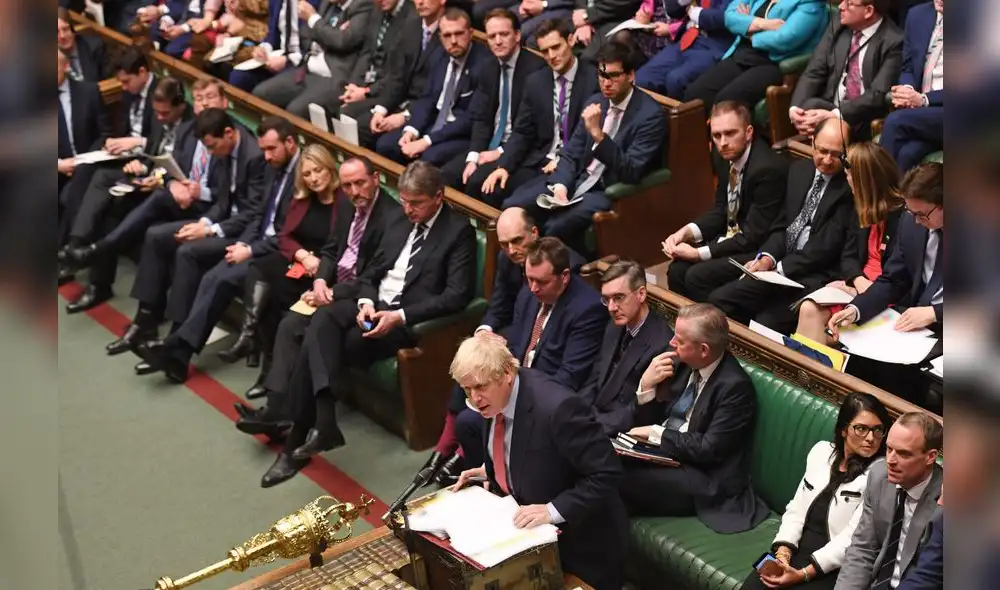A handout photograph released by the UK Parliament shows Britain's Prime Minister Boris Johnson appearing in the House of Commons in central London on January 22, 2020, during the Prime Minister's Questions (PMQ) session. (Photo by JESSICA TAYLOR / various sources / AFP) / RESTRICTED TO EDITORIAL USE - NO USE FOR ENTERTAINMENT, SATIRICAL, ADVERTISING PURPOSES - MANDATORY CREDIT " AFP PHOTO / Jessica Taylor /UK Parliament" A handout photograph released by the UK Parliament shows Britain's Prime Minister Boris Johnson appearing in the House of Commons in central London on January 22, 2020, during the Prime Minister's Questions (PMQ) session. (Photo by JESSICA TAYLOR / various sources / AFP) / RESTRICTED TO EDITORIAL USE - NO USE FOR ENTERTAINMENT, SATIRICAL, ADVERTISING PURPOSES - MANDATORY CREDIT " AFP PHOTO / Jessica Taylor /UK Parliament"