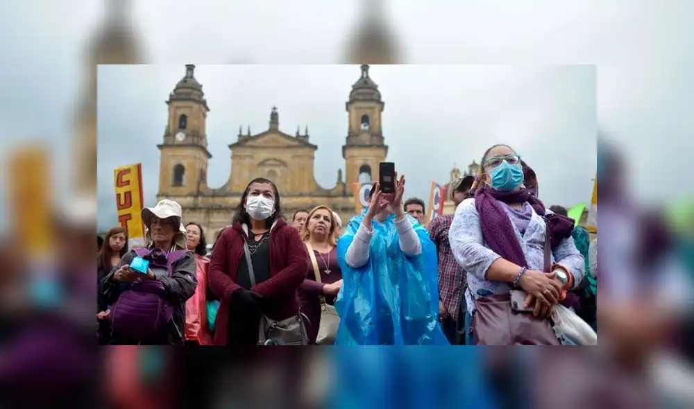 Cifra actualizada de infectados y muertes por COVID-19 en Colombia. (Foto: AFP)