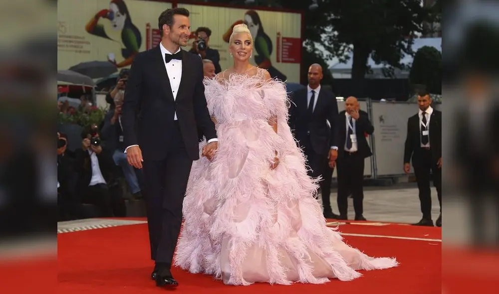 Actress and singer Lady Gaga, right, and actor Bradley Cooper pose for photographers upon arrival at the premiere of the film 'A Star Is Born' at the 75th edition of the Venice Film Festival in Venice, Italy, Friday, Aug. 31, 2018. (Photo by Joel C Ryan/Invision/AP)
