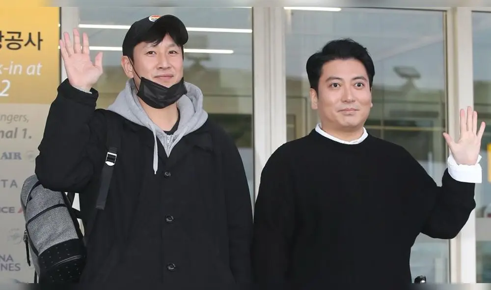 Lee Sun Kyun y Park Myung Hoon en el aeropuerto de Incheon.