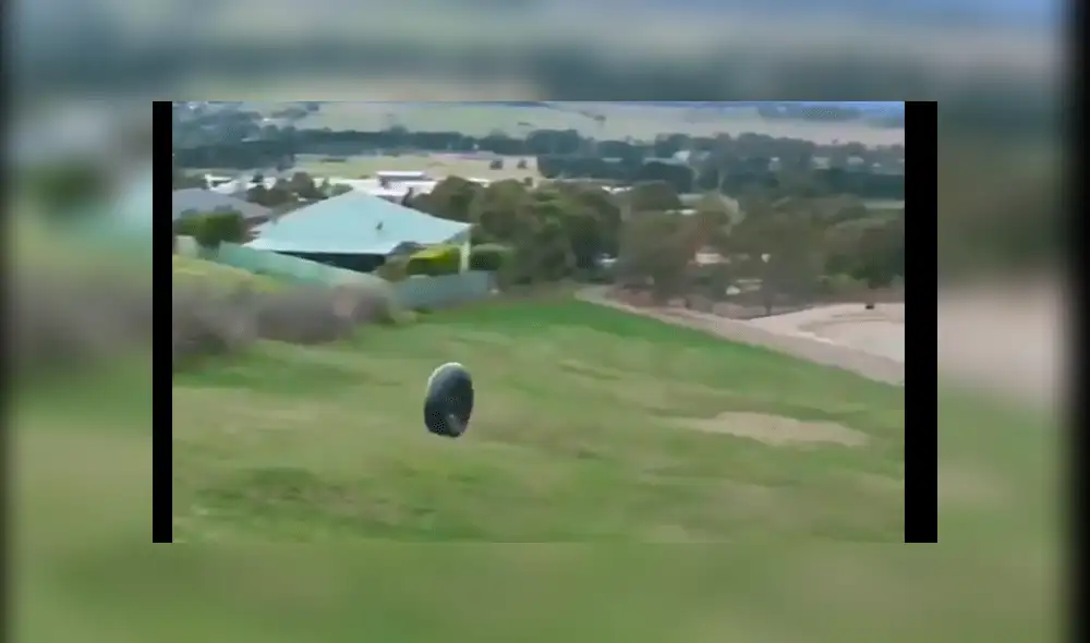 YouTube viral: chico se sube a llanta para lanzarse desde elevada colina y pasa esto [VIDEO]