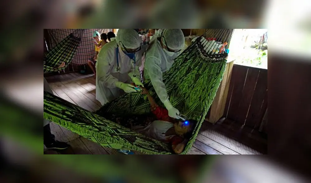 Trabajadores de salud de Brasil visitan comunidades ribereñas del municipio de Melgaco para realizarles pruebas de COVID-19. Foto: AFP. Trabajadores de salud de Brasil visitan comunidades ribereñas del municipio de Melgaco para realizarles pruebas de COVID-19. Foto: AFP.
