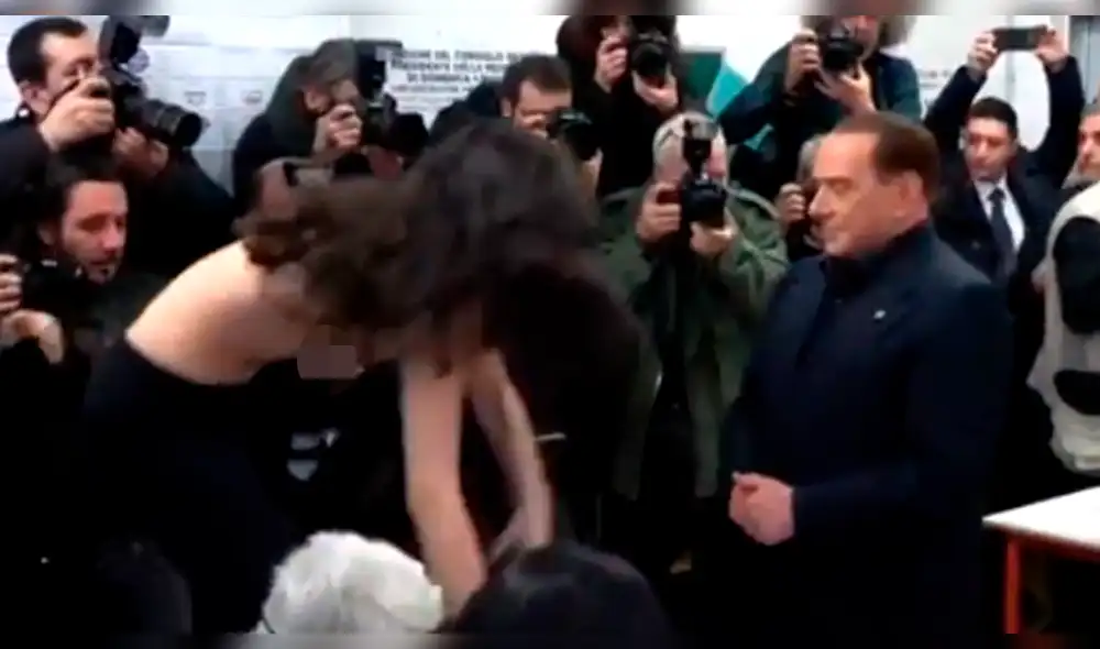 Italia: Mujer se desnudó cuando iba a votar Silvio Berlusconi [VIDEO]
