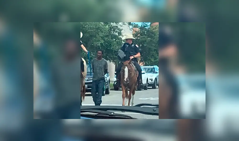 Estados Unidos: afroamericano es atado a una cuerda y llevado a pie por oficiales en caballo [FOTOS]