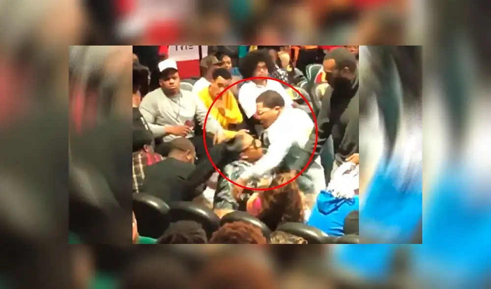 Boxeador ahorca a su pareja en pleno partido de básquet y público se queda mirando [VIDEO]