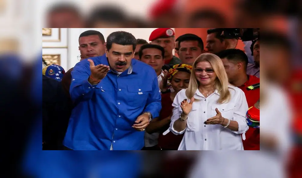Venezuelan president Nicolas Maduro, with his wife Cilia Flores, speaks during a march for International Youth Day in Caracas, Venezuela on February 12, 2020. (Photo by CRISTIAN HERNANDEZ / AFP) Venezuelan president Nicolas Maduro, with his wife Cilia Flores, speaks during a march for International Youth Day in Caracas, Venezuela on February 12, 2020. (Photo by CRISTIAN HERNANDEZ / AFP)