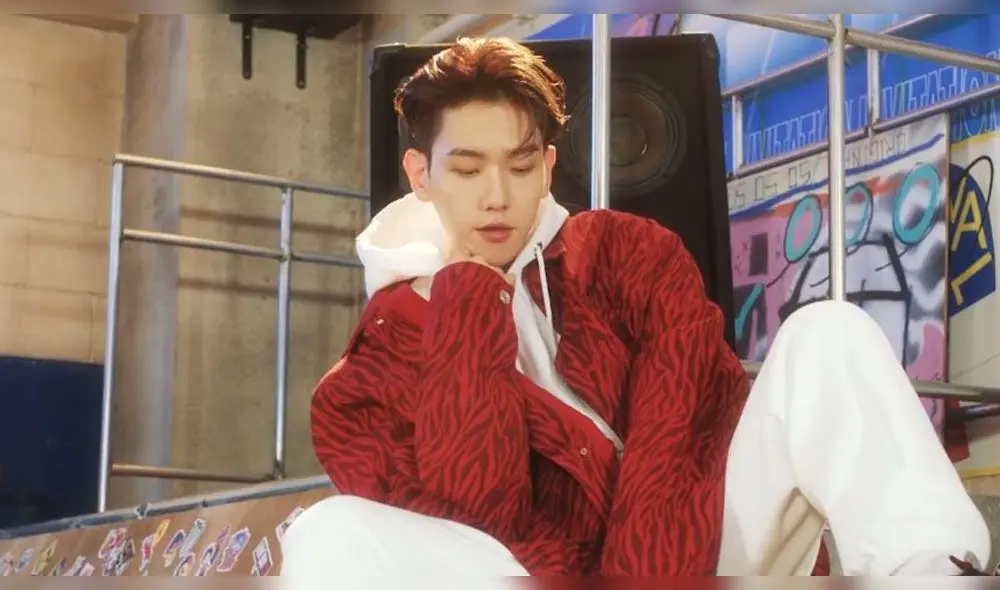 Desliza para ver más fotos de Baekhyun de EXO en el MV "Candy".
