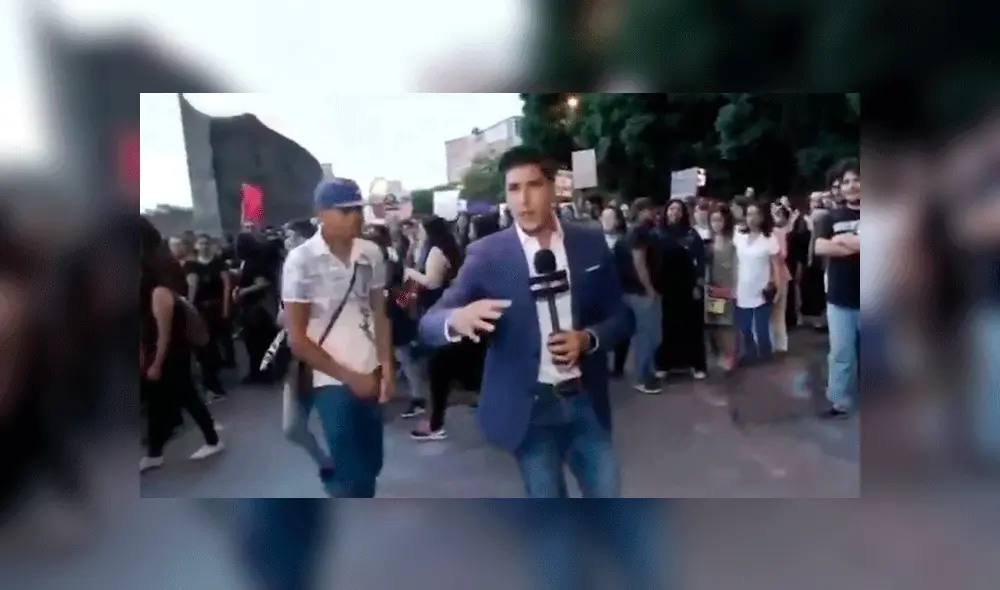 Juan Manuel Jiménez fue agredido mientras cubría una marcha contra la violencia de género. Foto: Captura