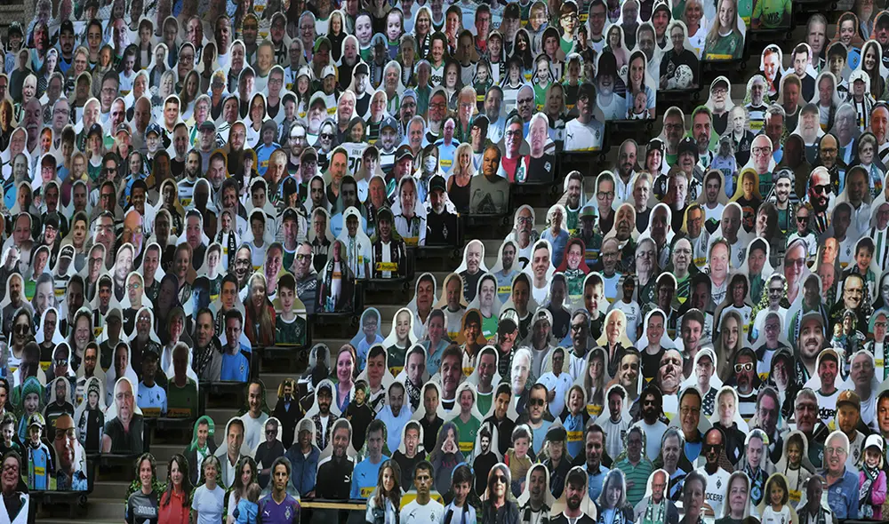 Algunos clubes de la Bundesliga decidieron poner imágenes de sus hinchas en las tribunas. | Foto: AFP