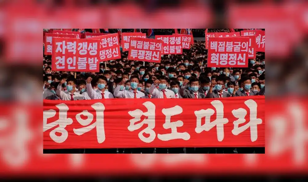 Participantes con máscaras faciales asisten a una manifestación que marca el inicio de una Campaña de 80 días. Foto: AFP Participantes con máscaras faciales asisten a una manifestación que marca el inicio de una Campaña de 80 días. Foto: AFP