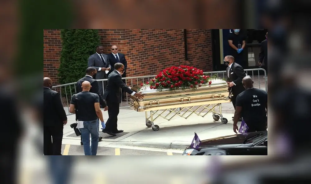 MINNEAPOLIS, MINNESOTA - JUNE 04: The remains of George Floyd are carried from Trask Worship Center at North Central University following a memorial service on June 4, 2020 in Minneapolis, Minnesota. Floyd died while in police custody on May 25, after former Minneapolis police officer Derek Chauvin kneeled on his neck for nine minutes while detaining him. His death has sparked nationwide protests and rioting.   Scott Olson/Getty Images/AFP