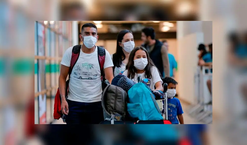 Pasajeros en aeropuerto de Santiago de Chile. Foto: AFP.