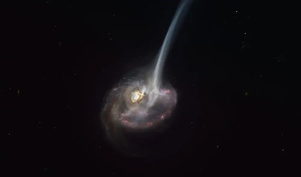 Ilustración de la galaxia que pierde su gas en una especie de cola después de chocar con otra. Foto: ESO Ilustración de la galaxia que pierde su gas en una especie de cola después de chocar con otra. Foto: ESO