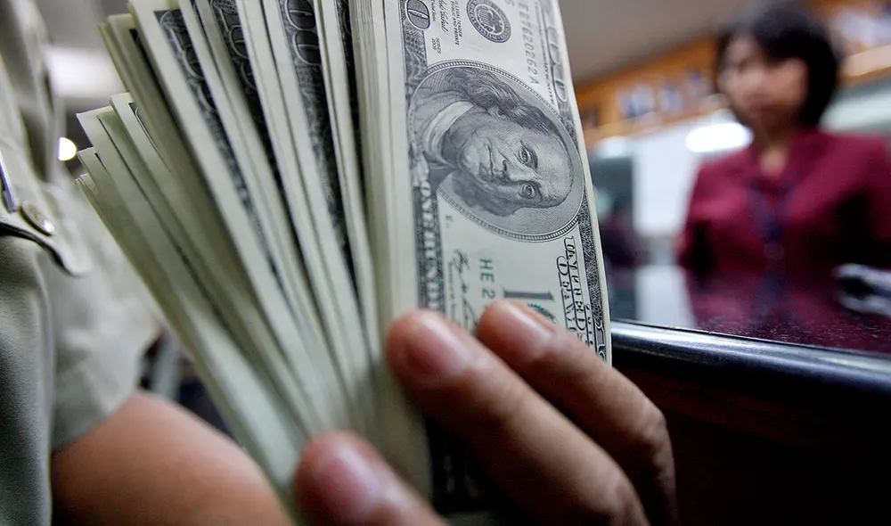 En el mercado paralelo, la divisa se ubicaba en S/3,73 la compra y S/3,75 la venta. Foto: AFP En el mercado paralelo, la divisa se ubicaba en S/3,73 la compra y S/3,75 la venta. Foto: AFP