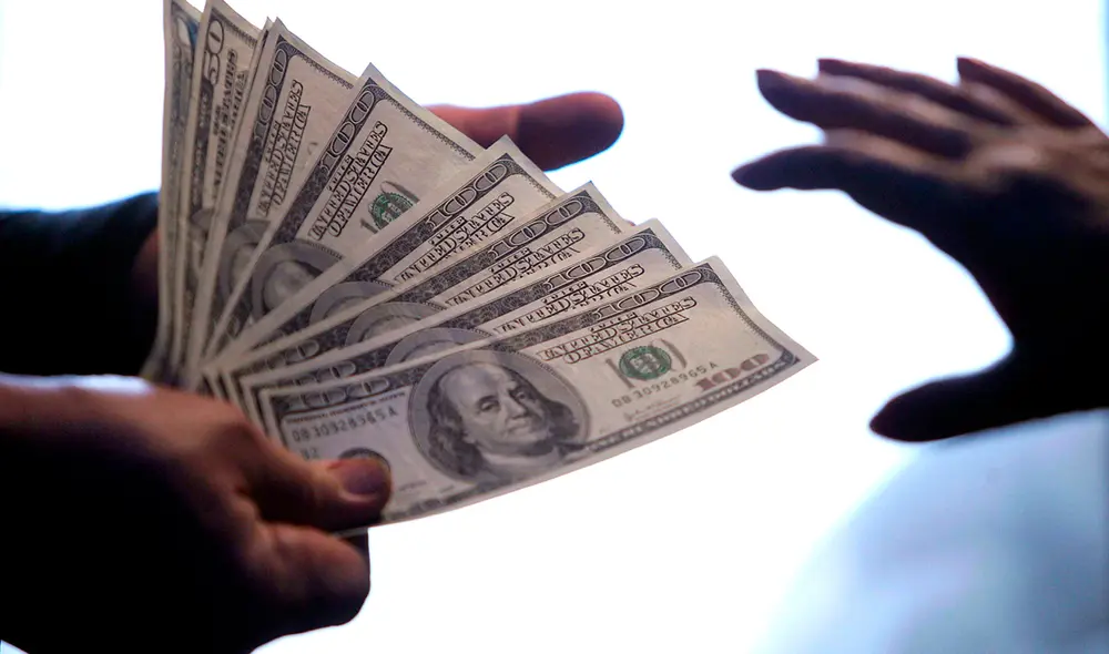 En el mercado paralelo, el dólar se compró a 3,61 soles y se vendió a 3,64 soles. Foto: AFP En el mercado paralelo, el dólar se compró a 3,61 soles y se vendió a 3,64 soles. Foto: AFP