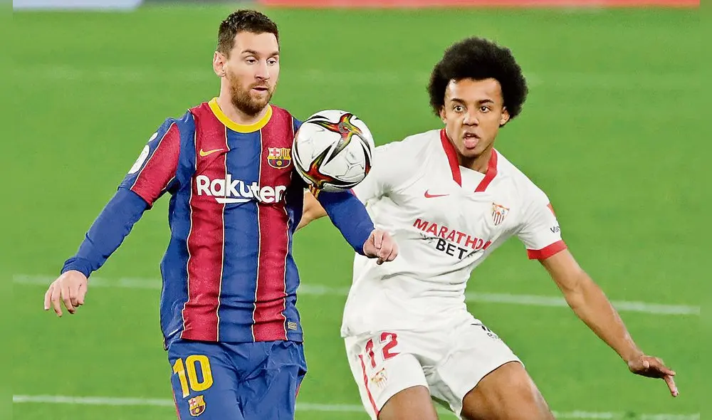 Luchado. Lionel Messi disputa un balón con Koundé, quien abrió el marcador en el Sánchez Pizjuán con un golazo. Foto: EFE Luchado. Lionel Messi disputa un balón con Koundé, quien abrió el marcador en el Sánchez Pizjuán con un golazo. Foto: EFE