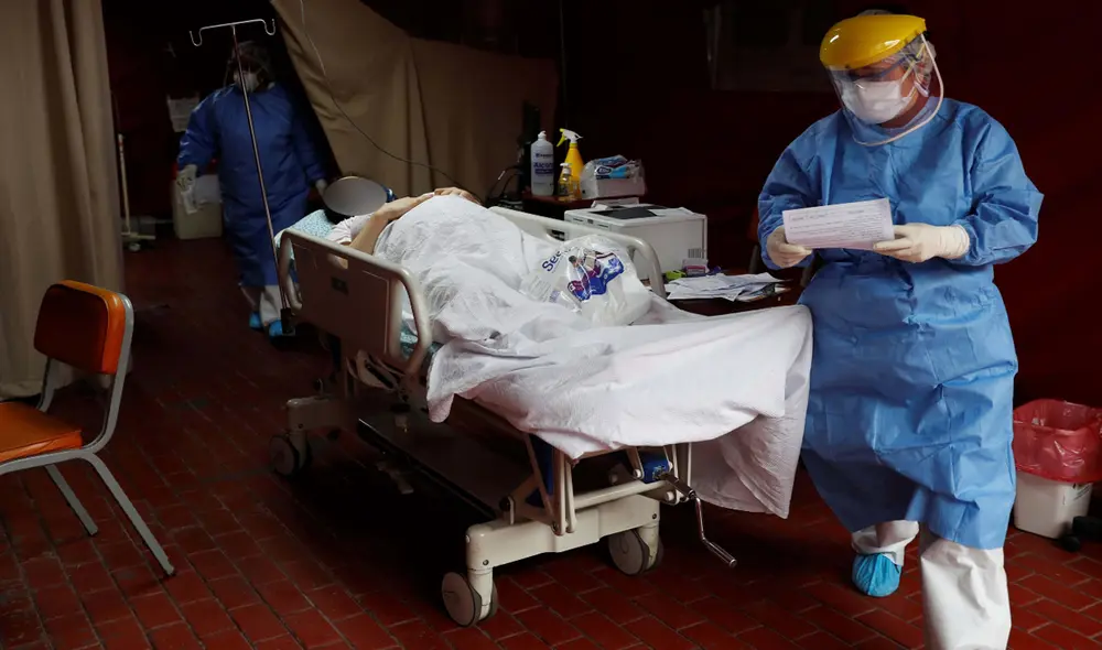 Imagen referencial de una mujer embarazada con COVID-19 mientras es atendida en el Instituto Perinatal de Lima. Foto: Paolo Aguilar / EFE