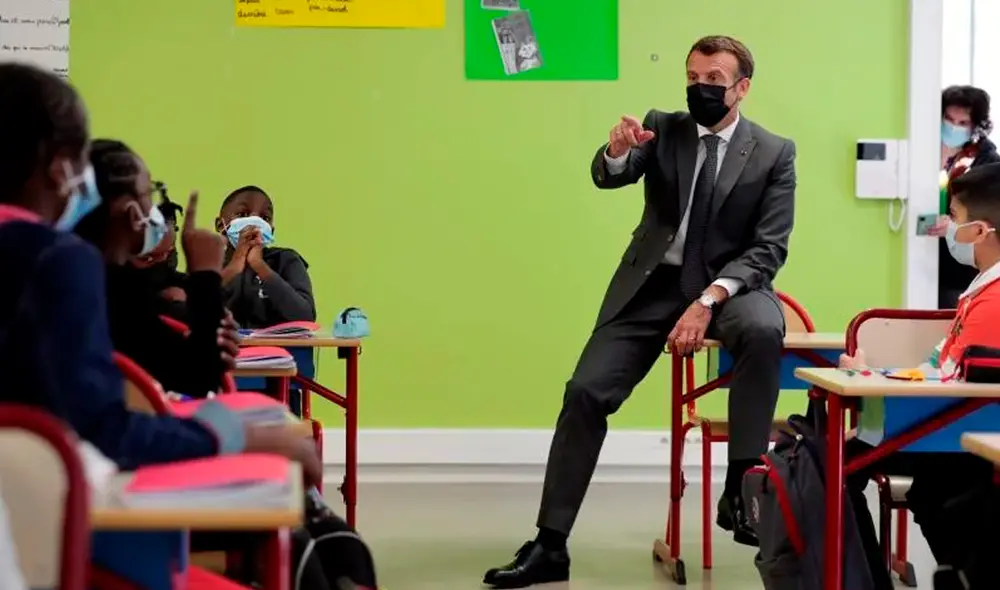 El ministro de Educación visitó, junto al presidente Emmanuel Macron, una escuela de las afueras de París. Foto: EFE