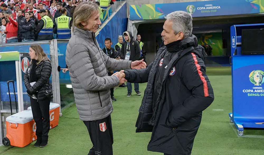 Ricardo Gareca y Reinaldo Rueda se han enfrentado tres veces como técnicos. Foto: AFP Ricardo Gareca y Reinaldo Rueda se han enfrentado tres veces como técnicos. Foto: AFP