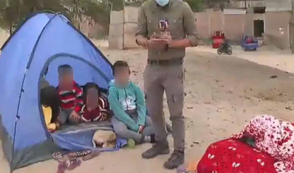 Menores de edad también durmieron en los exteriores de su vivienda.Foto: captura de Latina