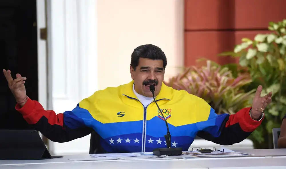 "Hay que dialogar hasta con el diablo. Vamos con la cruz, con el agua bendita, con las bendiciones de Dios”, expresó Nicolás Maduro sobre el próximo proceso de negociación entre su gobierno y la oposición. Foto: AFP "Hay que dialogar hasta con el diablo. Vamos con la cruz, con el agua bendita, con las bendiciones de Dios”, expresó Nicolás Maduro sobre el próximo proceso de negociación entre su gobierno y la oposición. Foto: AFP
