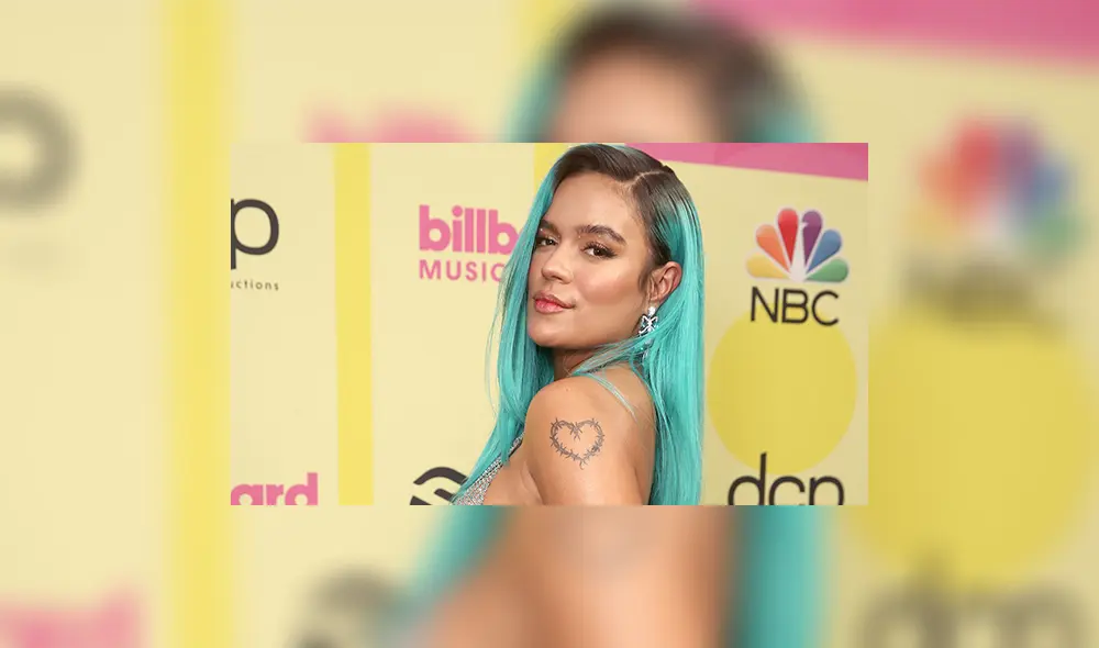 En las fotografías de la revista Billboard, Karol G aparece con un camisón de pijama blanco con encaje. Foto: difusión