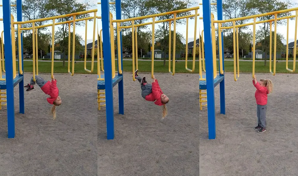 La niña de tres años de edad haciendo una pirueta en el pasamano. Foto: captura de YouTube