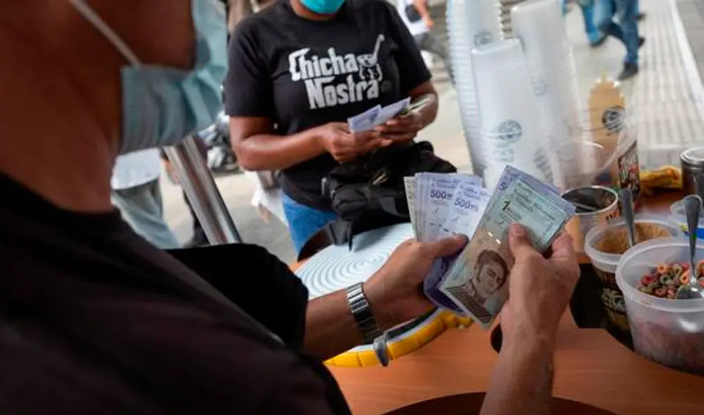 El precio del dólar BCV hoy, 3 de diciembre. La tasa oficial autorizada por el régimen de Nicolás Maduro para contrarrestar el mercado paralelo. Foto: AFP El precio del dólar BCV hoy, 3 de diciembre. La tasa oficial autorizada por el régimen de Nicolás Maduro para contrarrestar el mercado paralelo. Foto: AFP