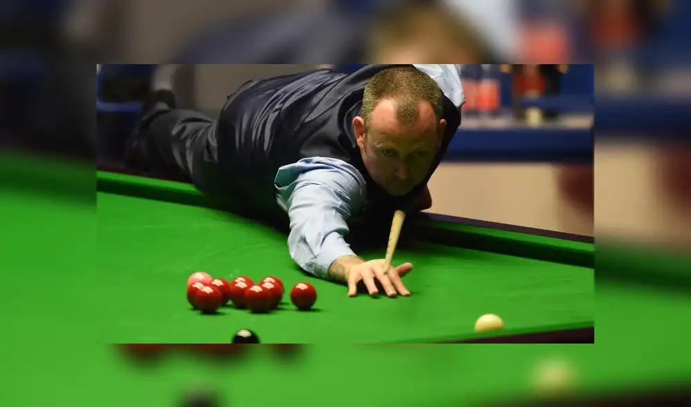 El snooker es una modalidad del billar que se juega en una mesa más larga de lo habitual y que tiene las clásicas troneras (hoyos). Foto: AFP.