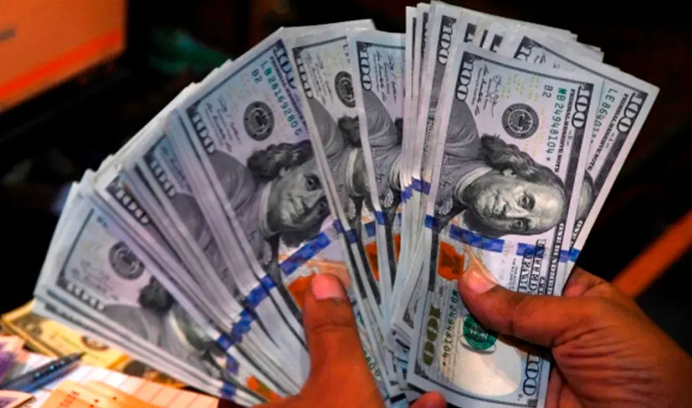 El precio del dólar BCV es la tasa oficial autorizada por el régimen de Nicolás Maduro para contrarrestar el mercado paralelo. Foto: AFP