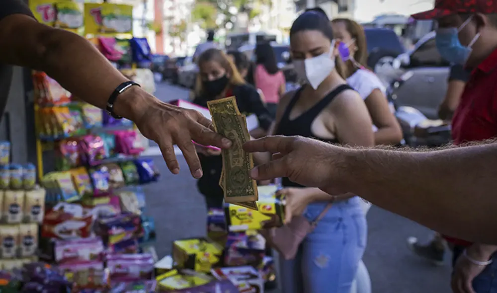 Precio del dólar en Venezuela hoy, miércoles 19 de enero, según DolarToday y Dólar Monitor. Foto. AFP Precio del dólar en Venezuela hoy, miércoles 19 de enero, según DolarToday y Dólar Monitor. Foto. AFP