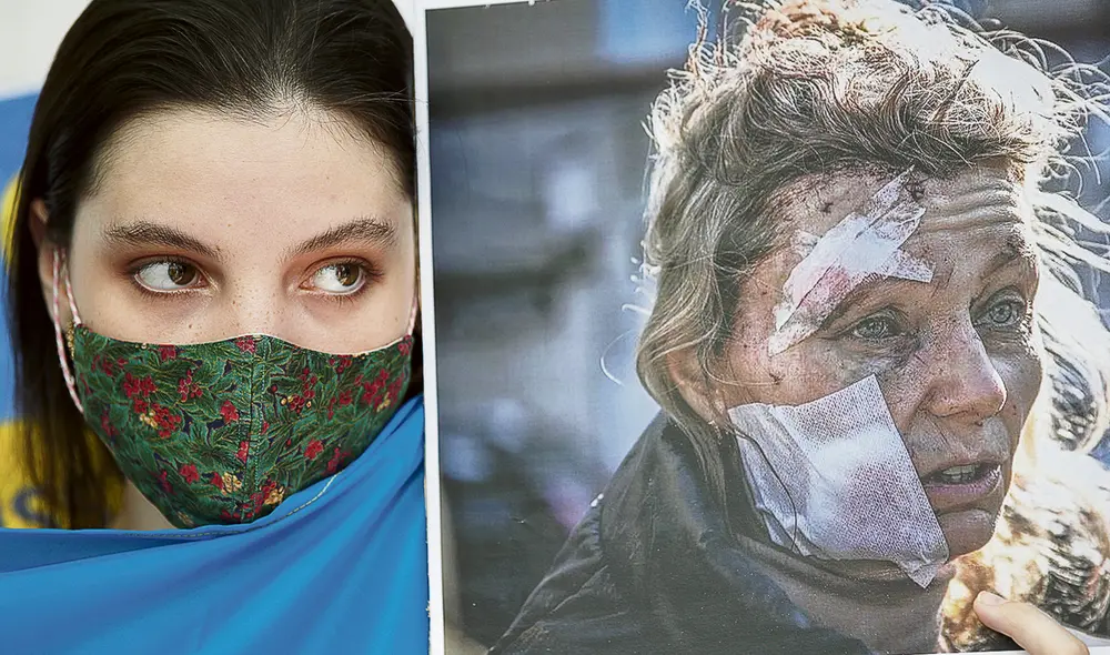 El rostro de la tragedia. Una manifestante porta el retrato de la profesora Olena Kurilo. Foto: EFE El rostro de la tragedia. Una manifestante porta el retrato de la profesora Olena Kurilo. Foto: EFE